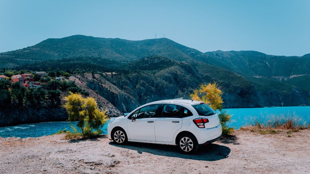Small hatchback car on hill roads.